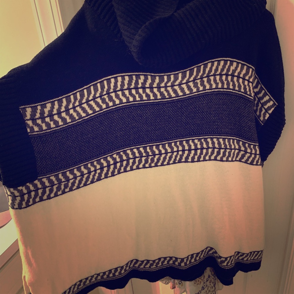 Wide neck poncho sweater.